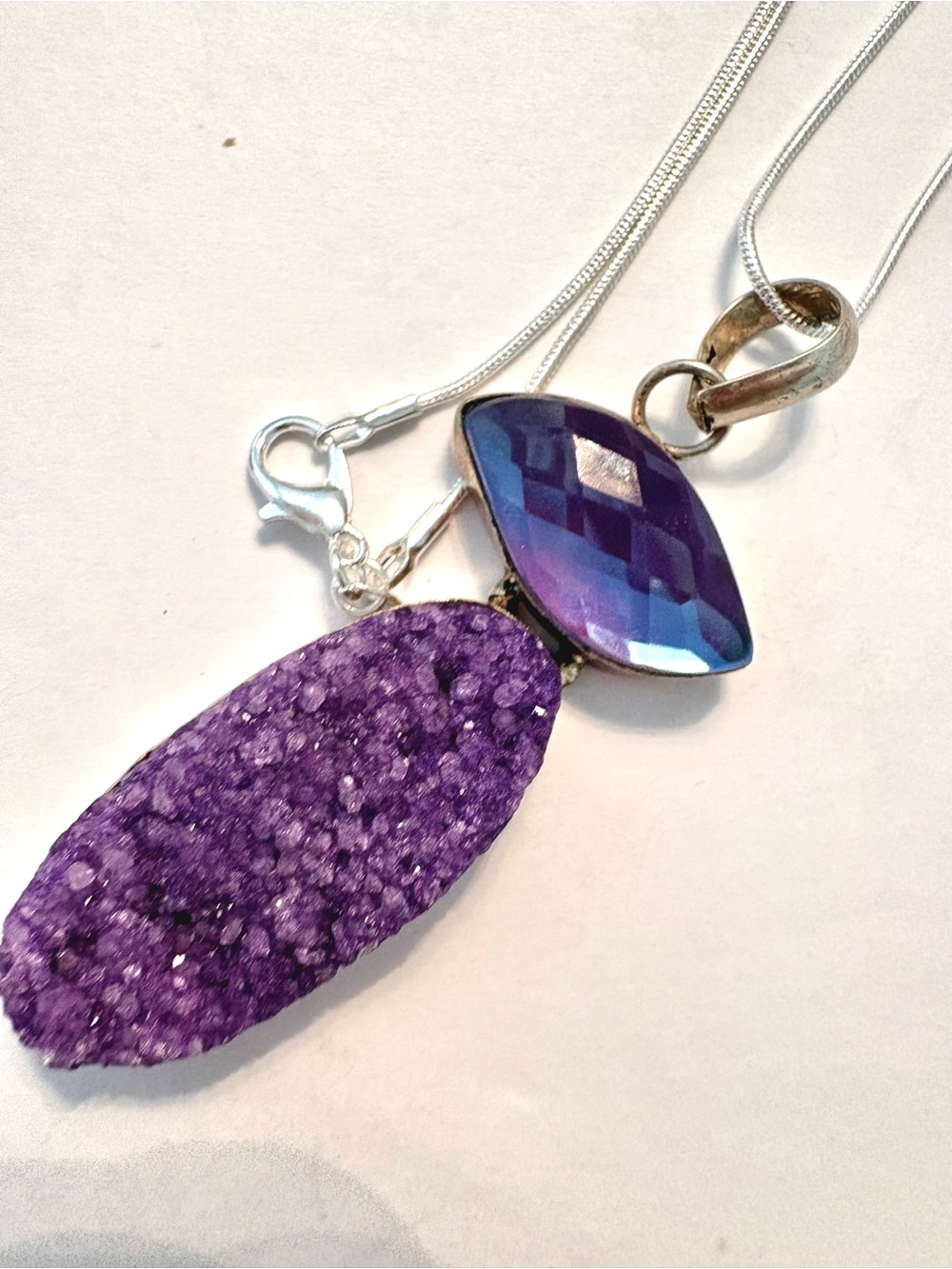 , 2 1/2 inch, Titanium Druzy and Mystic Topaz pendant in a silver chain.
